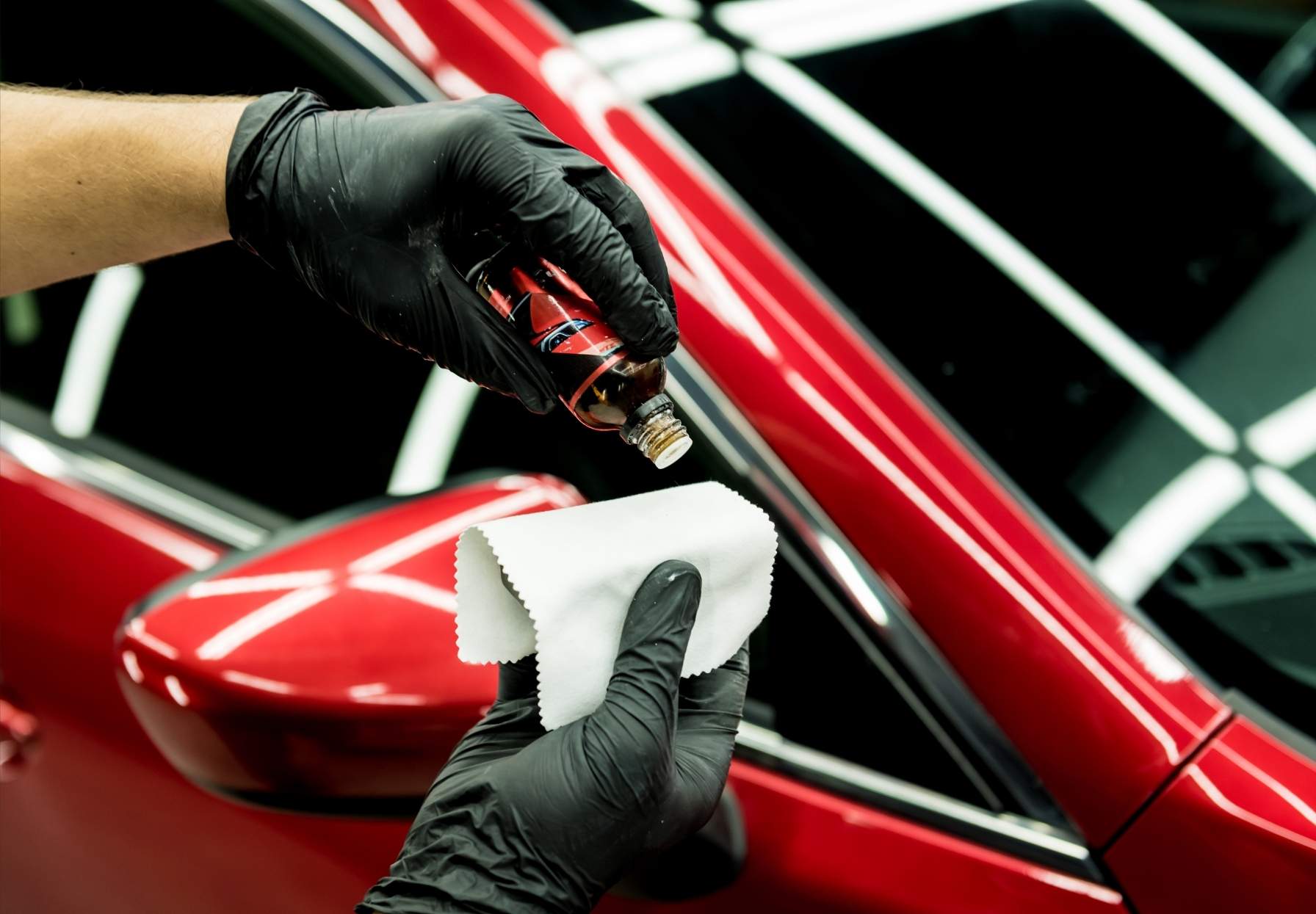 man ceramic coating a a car