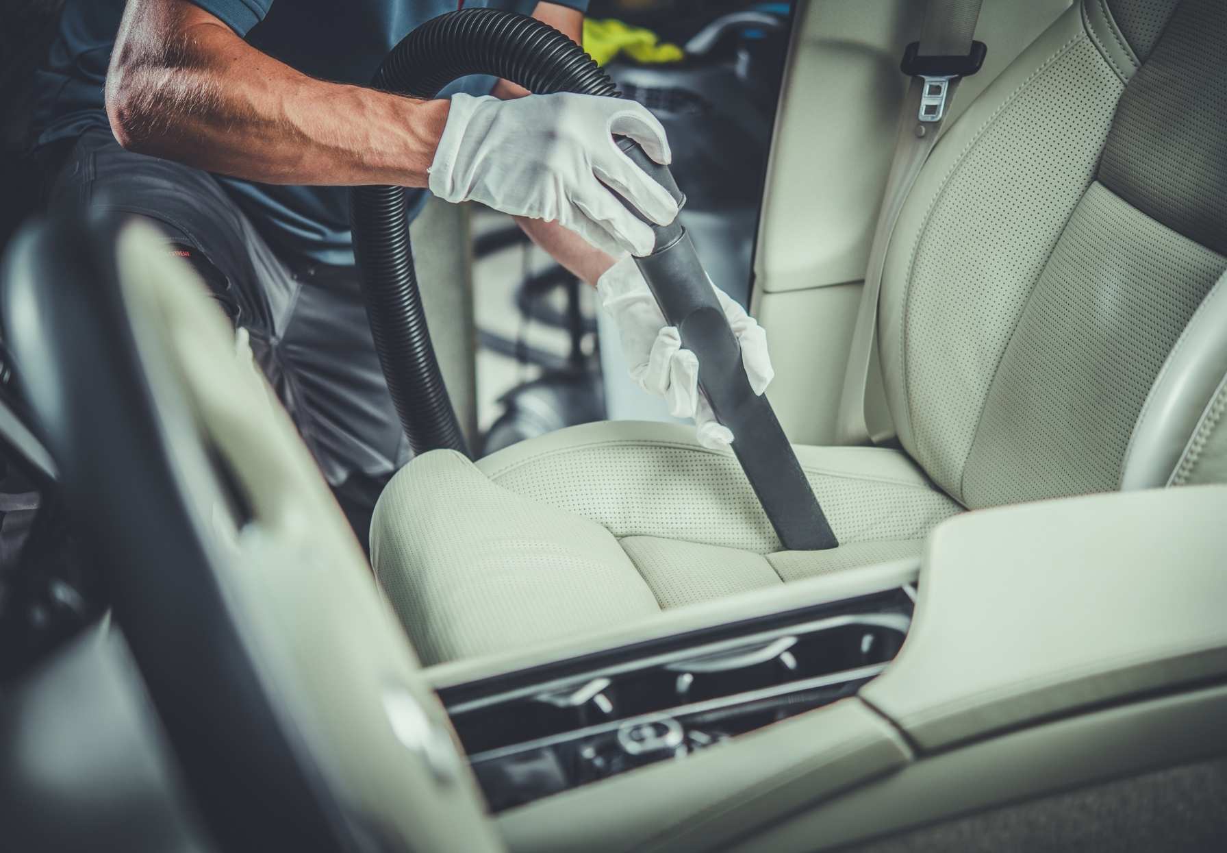 vacuuming car - mobile detailing