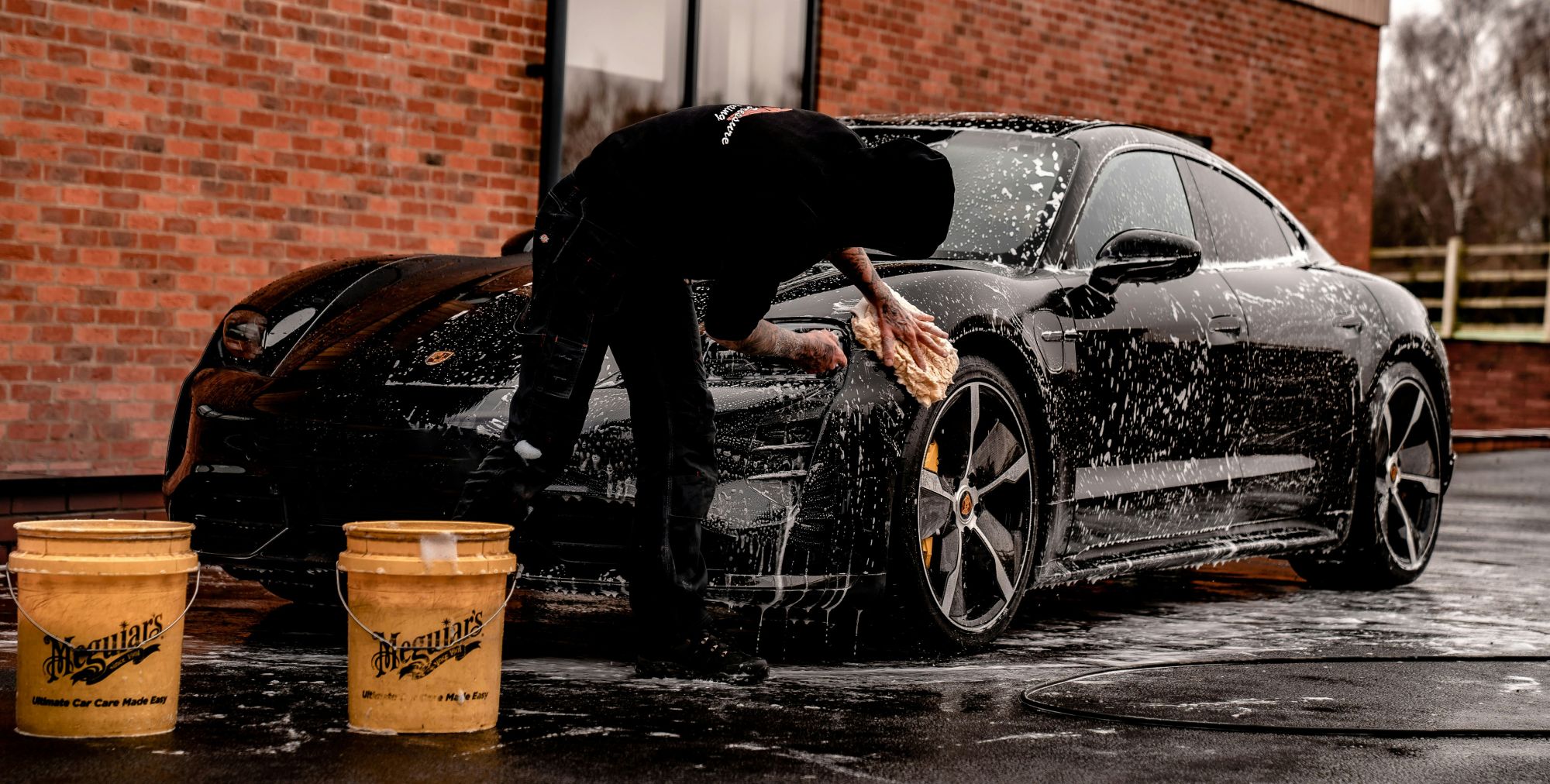 washing a black car